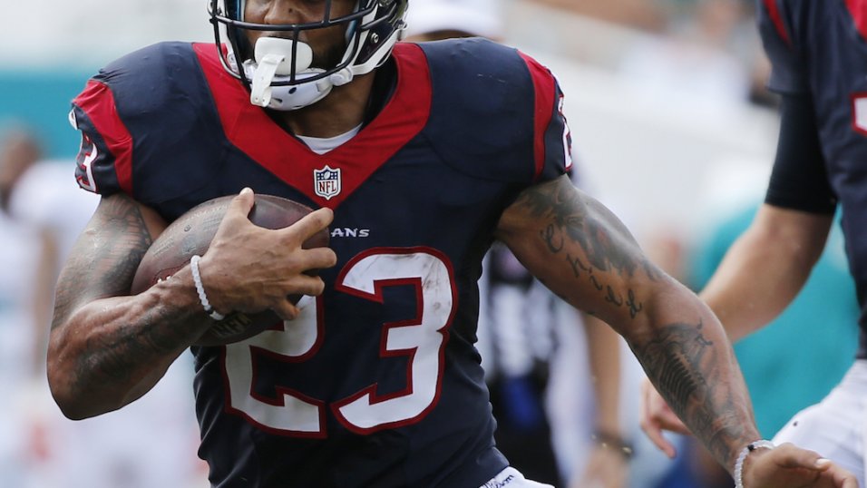 Houston Texans running back Arian Foster (23) runs against the Denver  Broncos during an NFL football