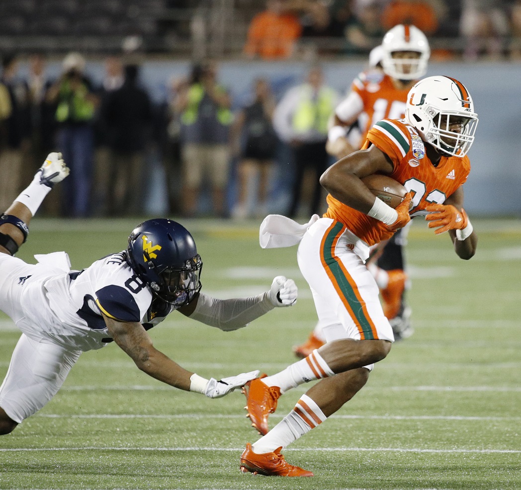 college-russell-athletic-bowl-grades-miami-west-virginia
