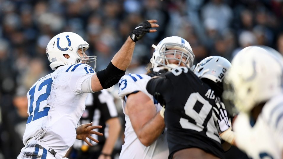 Raiders quarterback Marcus Mariota (8) dives for yardage against the  Indianapolis Colts in the …