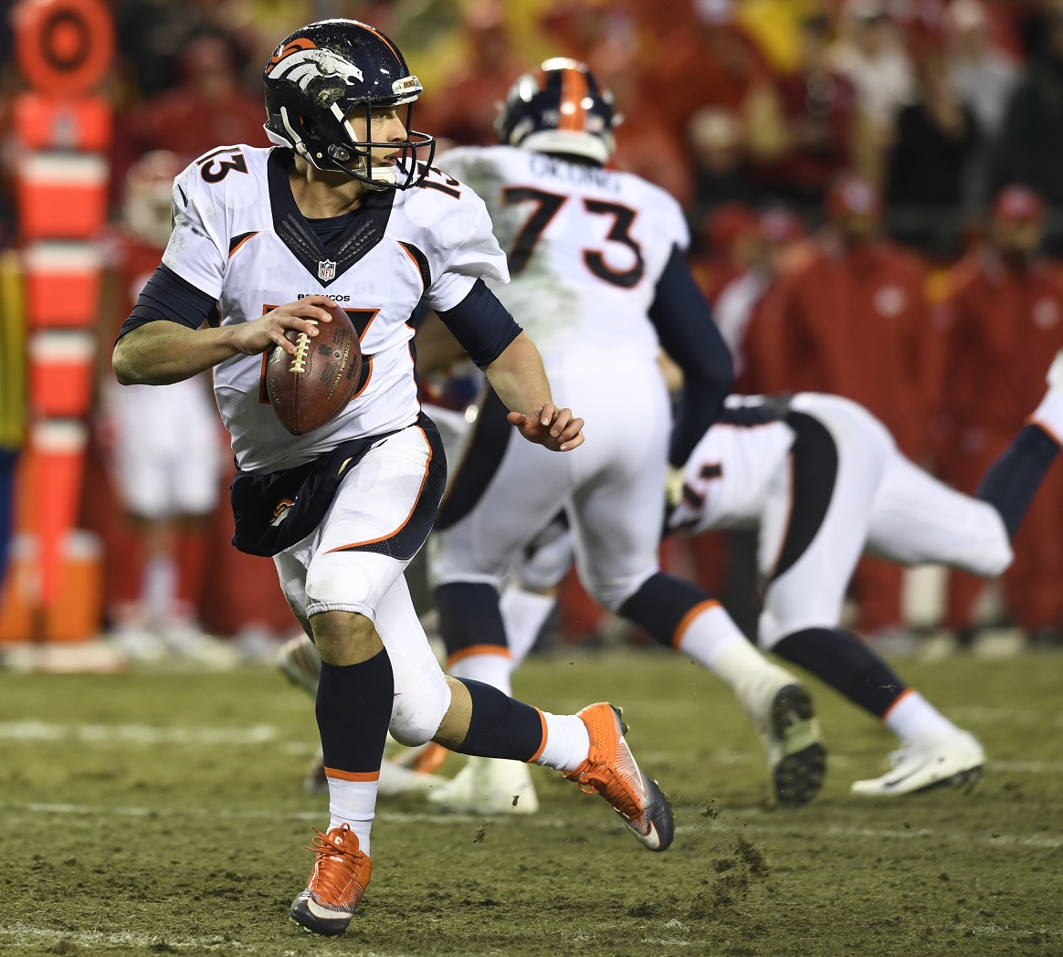 KANSAS CITY, MO: DECEMBER 25: Denver Broncos quarterback Trevor Siemian (13) drops back to pass against the Kansas City…
