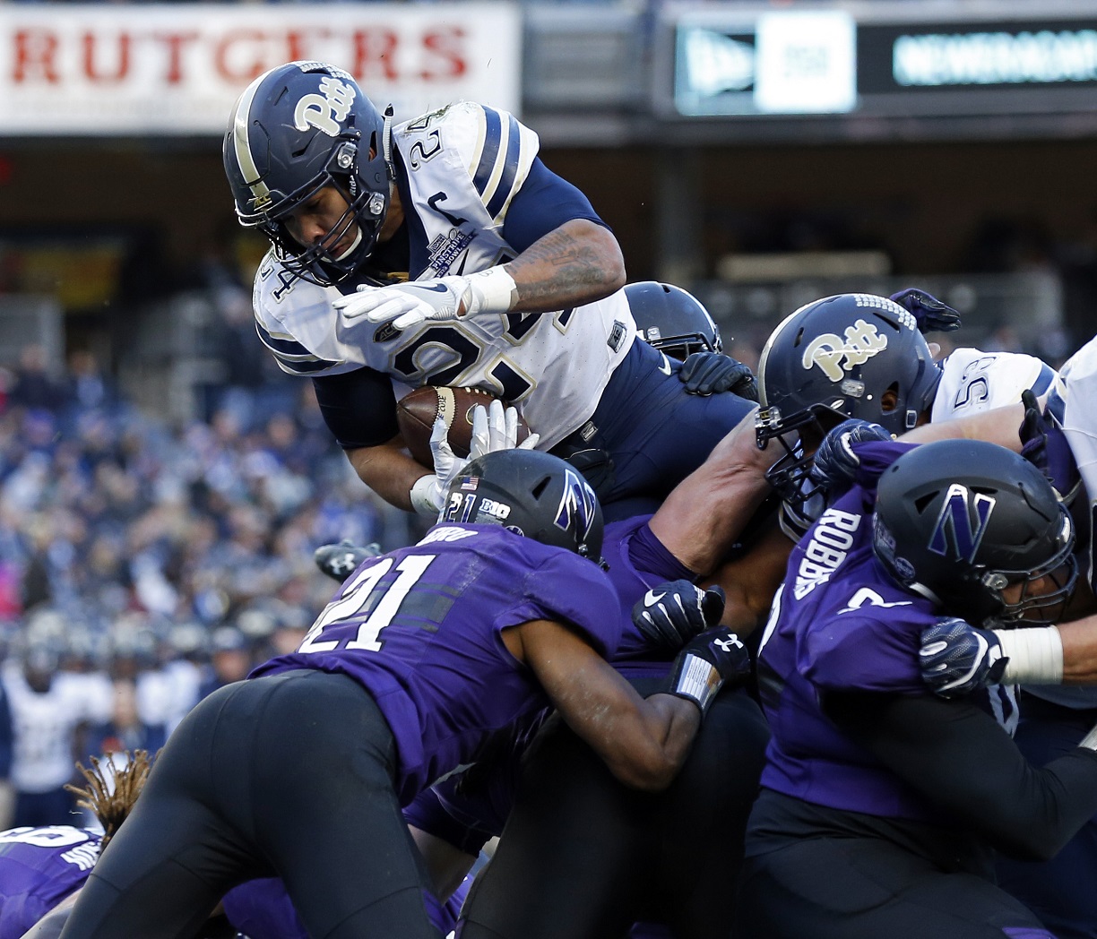 NEW YORK, NY - DECEMBER 28: Running back James Conner #24 of the Pittsburgh Panthers is stopped trying to score a touchdown…