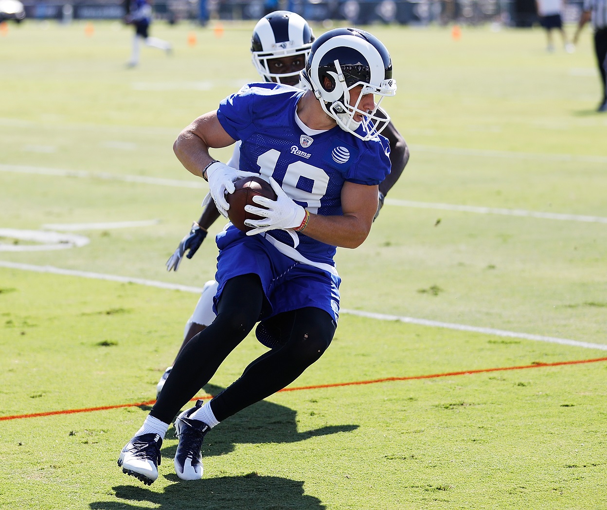 IRVINE, CA - JULY 29:  Cooper Kupp #18 of the Los Angeles Rams runs through a drill during the first day of Training Camp…