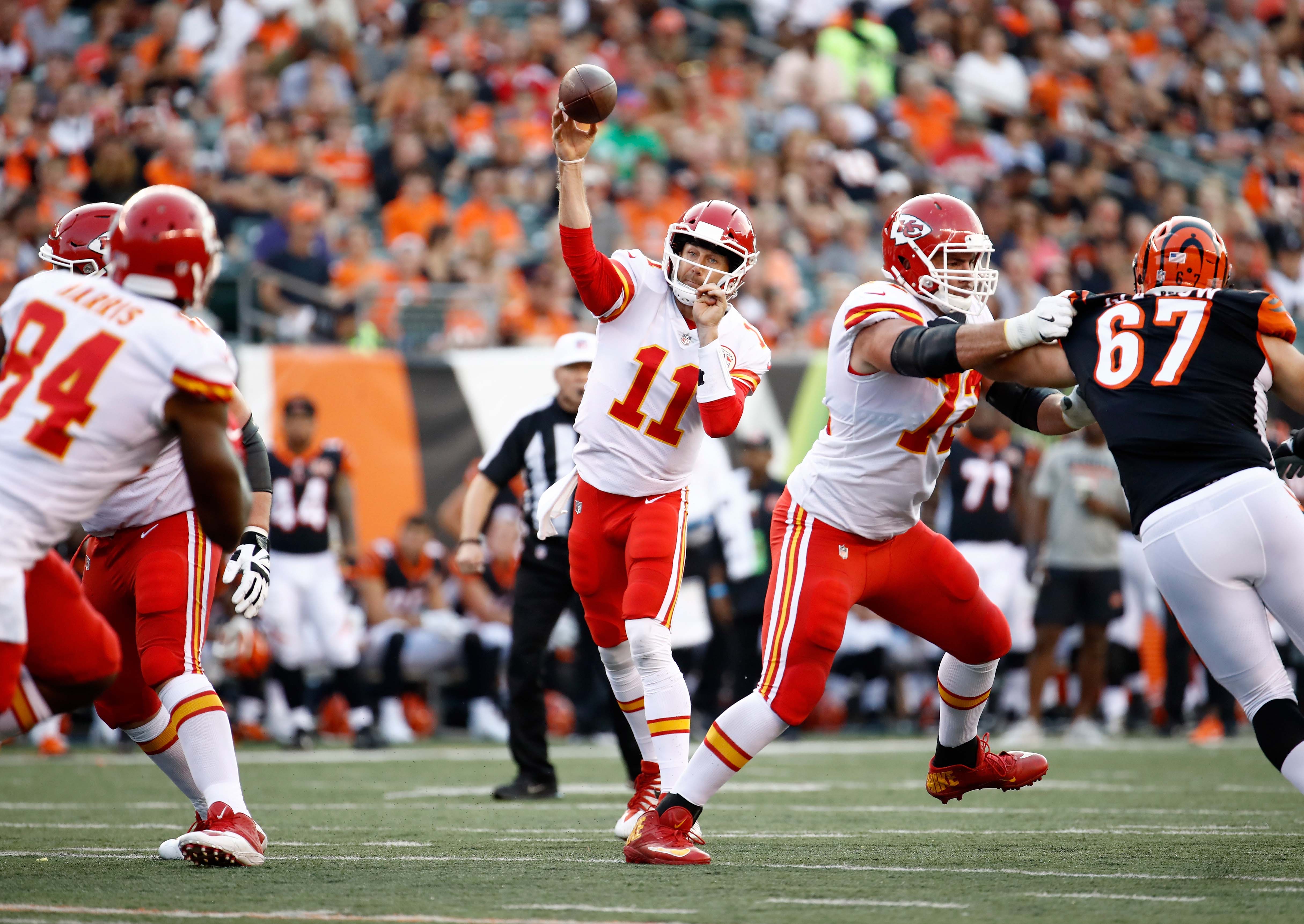 CINCINNATI, OH - AUGUST 19:  Alex Smith #11 of the Kansas City Chiefs throws a pass during the  preseason game against the…