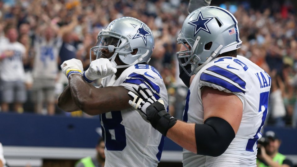 ARLINGTON, TX - DECEMBER 11: Dallas Cowboys Zack Martin (70) blocks during  the game featuring the