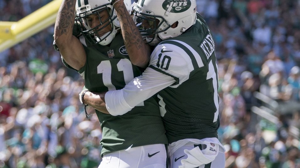 New York Jets wide receiver Robby Anderson (11) runs away from