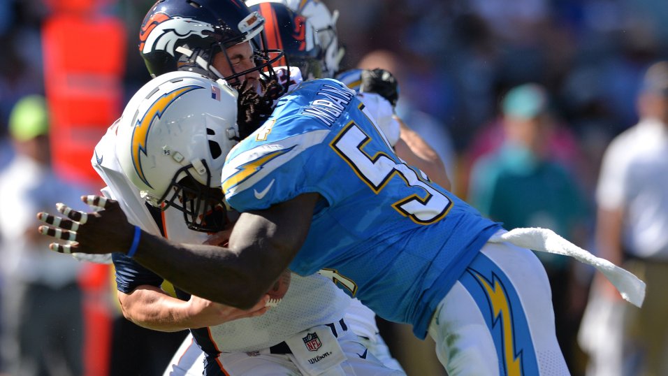 American football, WR Talib Wise, No. 4 Raiders, is tackled