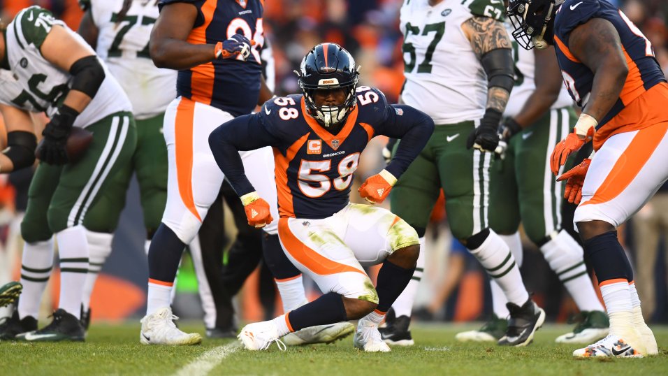 Denver Broncos outside linebacker Von Miller (58) takes part in