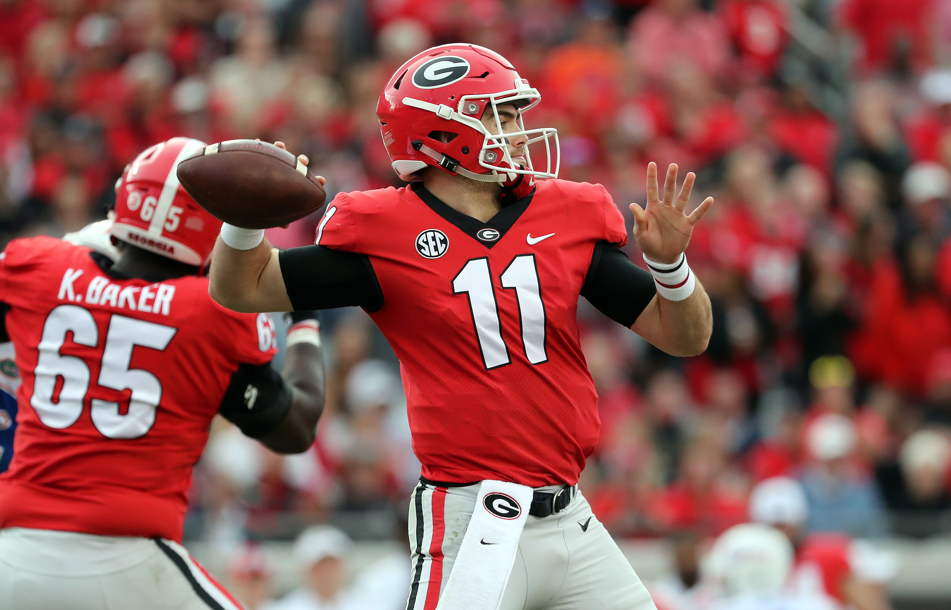 Jacksonville, FL, USA; Georgia Bulldogs quarterback Jake Fromm (11) throws the ball against the Florida Gators during the…
