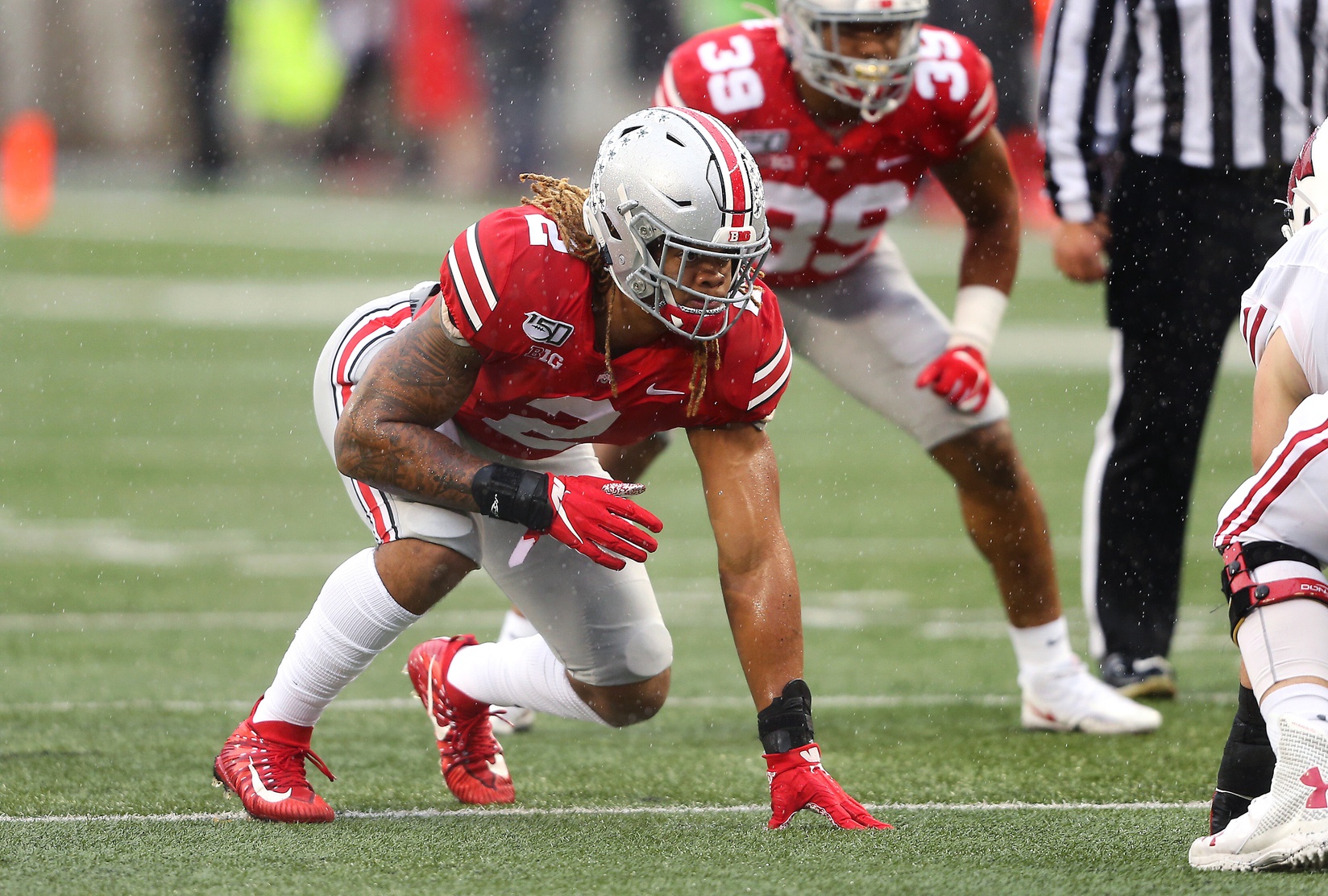 Indianapolis, Indiana, USA. 7th Dec, 2019. Ohio State Buckeyes defensive  end Chase Young (2) lines up on defense in the second half of the game  between the Wisconsin Badgers and the Ohio