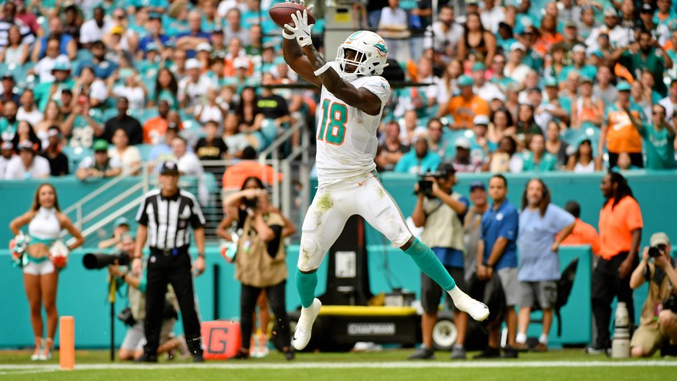 Miami Dolphins wide receiver Preston Williams (18) runs during an