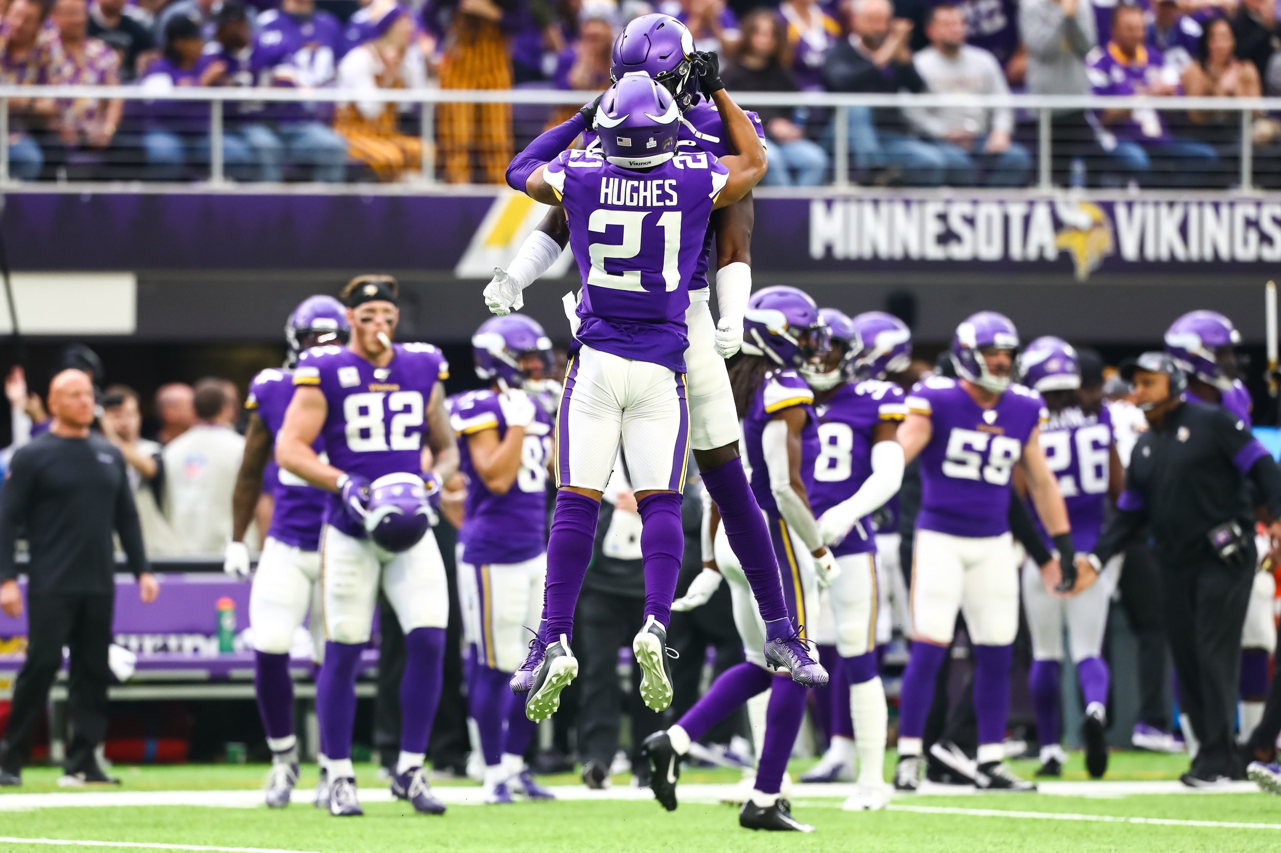 Adam Thielen of the Minnesota Vikings celebrates with Dakota Dozier