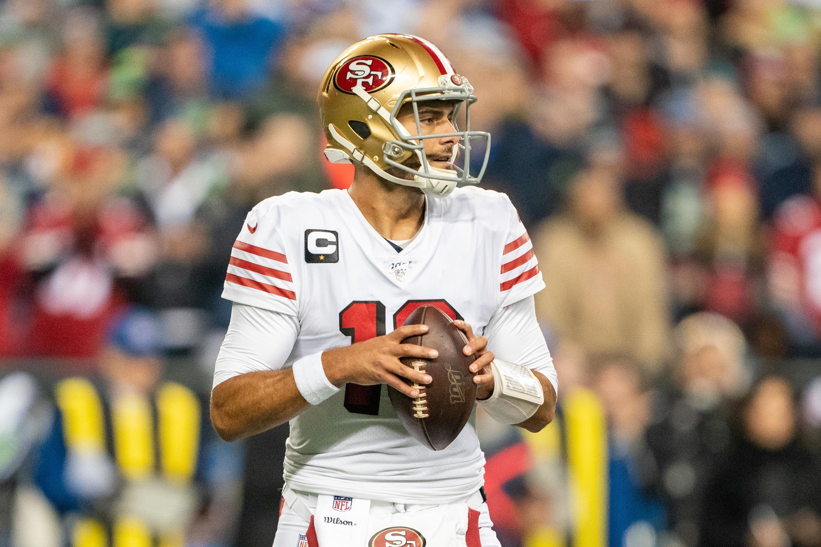 New Orleans Saints quarterback Drew Brees (8) is pressured while trying to  pass against the Seattle Seahawks during the third quarter at CenturyLink  Field in Seattle, Washington on December 2, 2013. The