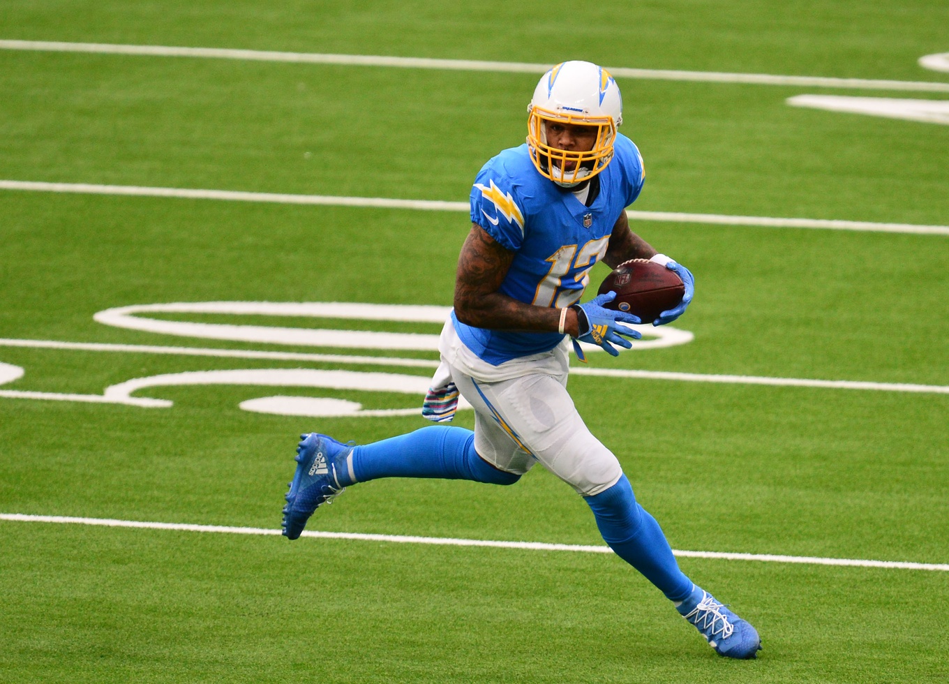 Los Angeles Rams wide receiver Tutu Atwell (15) makes a catch against  Dallas Cowboys cornerback Trevon Diggs (7) during a NFL game, Sunday,  October 9, 2022, at SoFi Stadium, in Inglewood, CA.