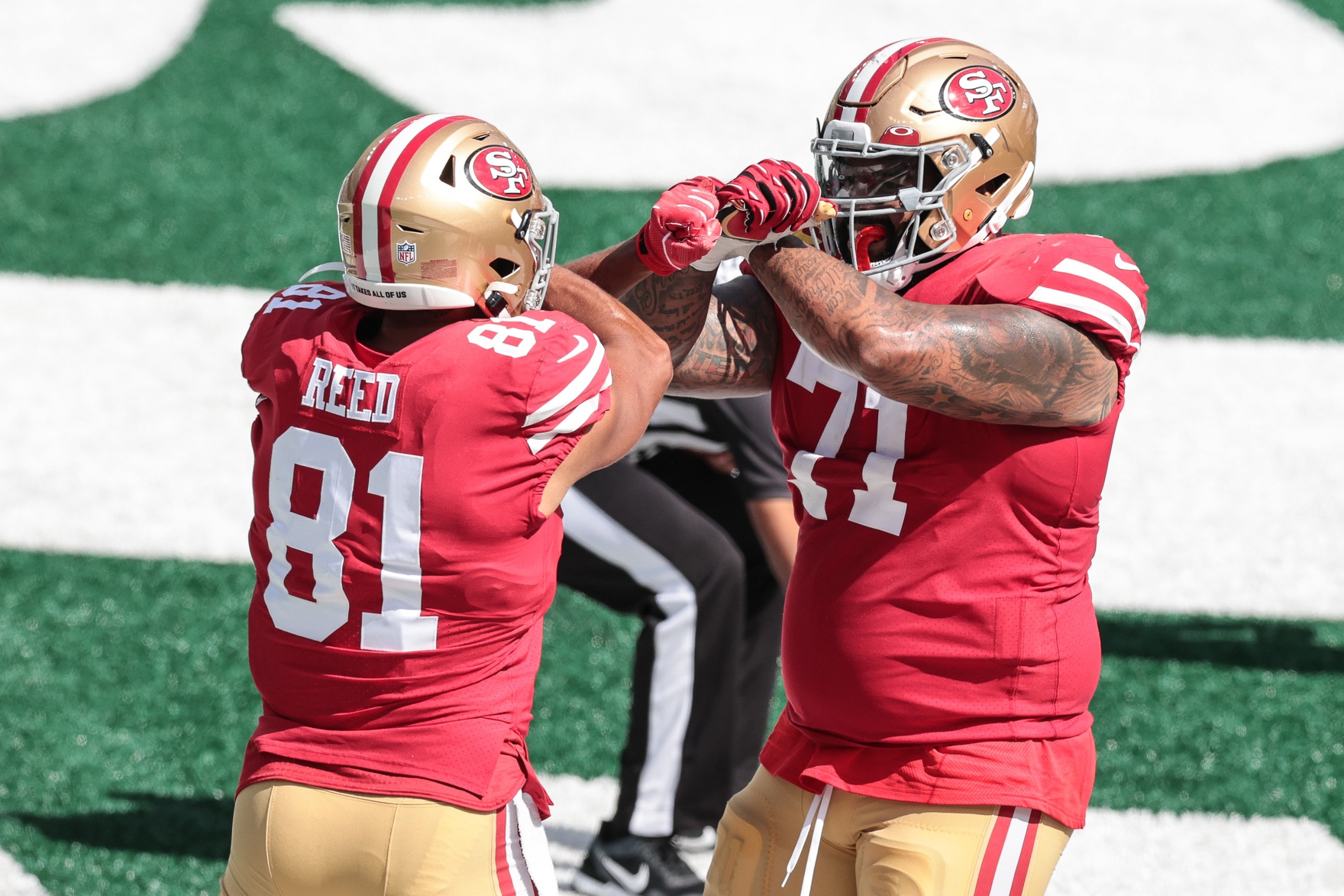 San Francisco 49ers tackle Trent Williams (71) walks on the sideline during  an NFL preseason football