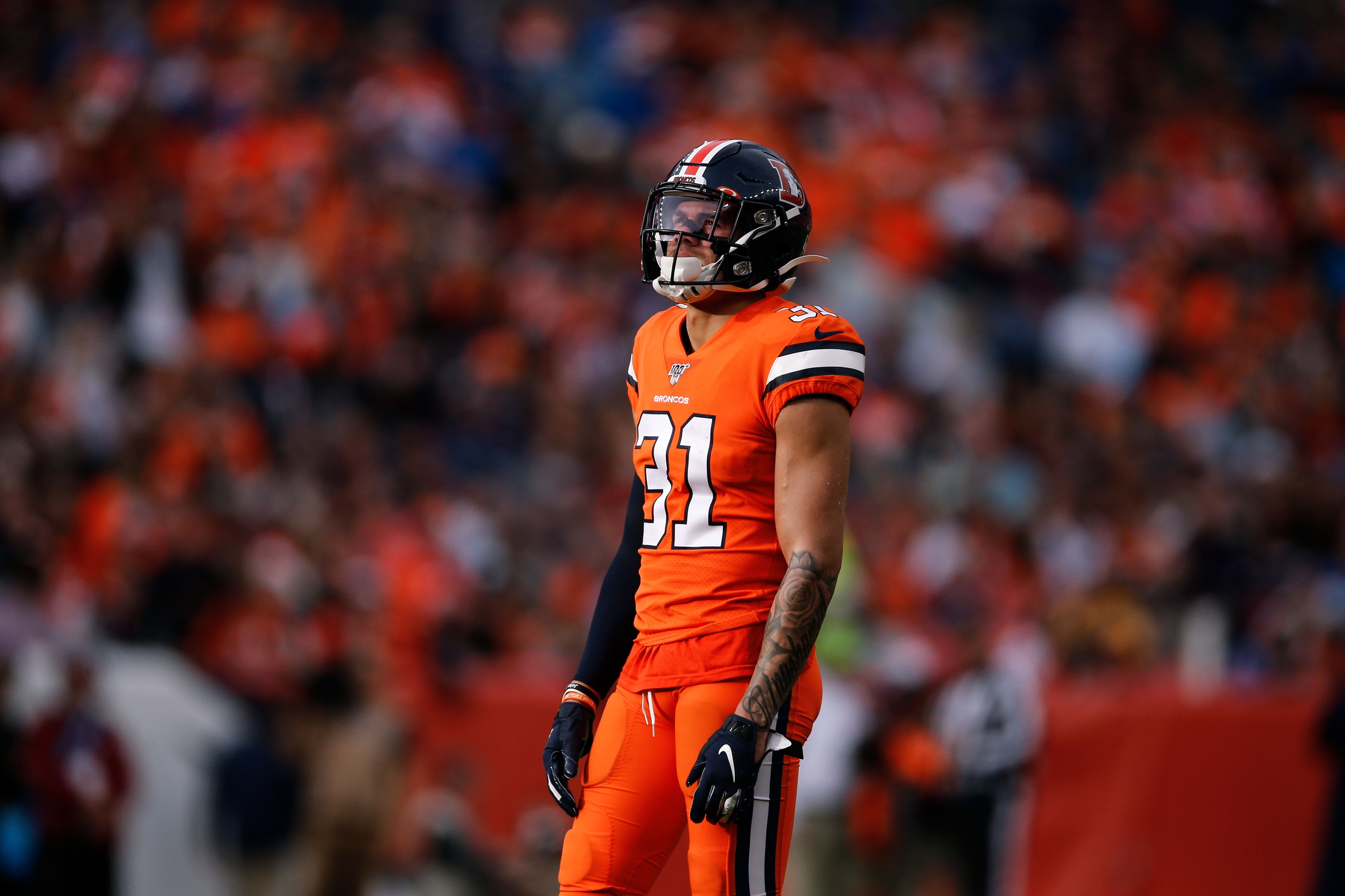 Denver Broncos free safety Justin Simmons (31) pursues against the