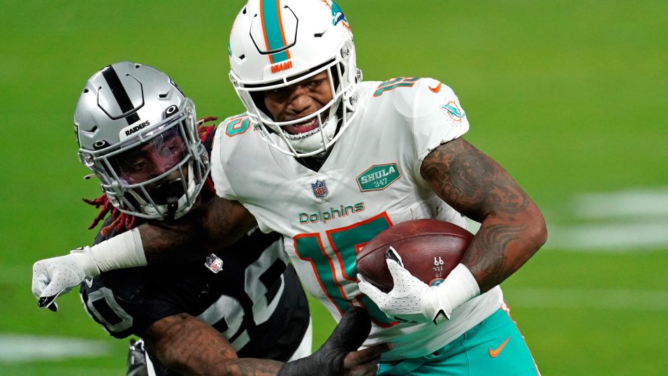 Miami Dolphins running back Lynn Bowden (15) runs the football during the  first half of an NFL …