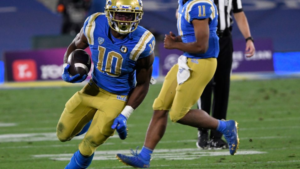 Bruins running back Demetric Felton J. gains yards on a run during