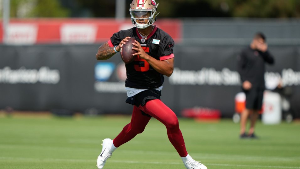 San Francisco 49ers quarterback Trey Lance (5) runs with the ball