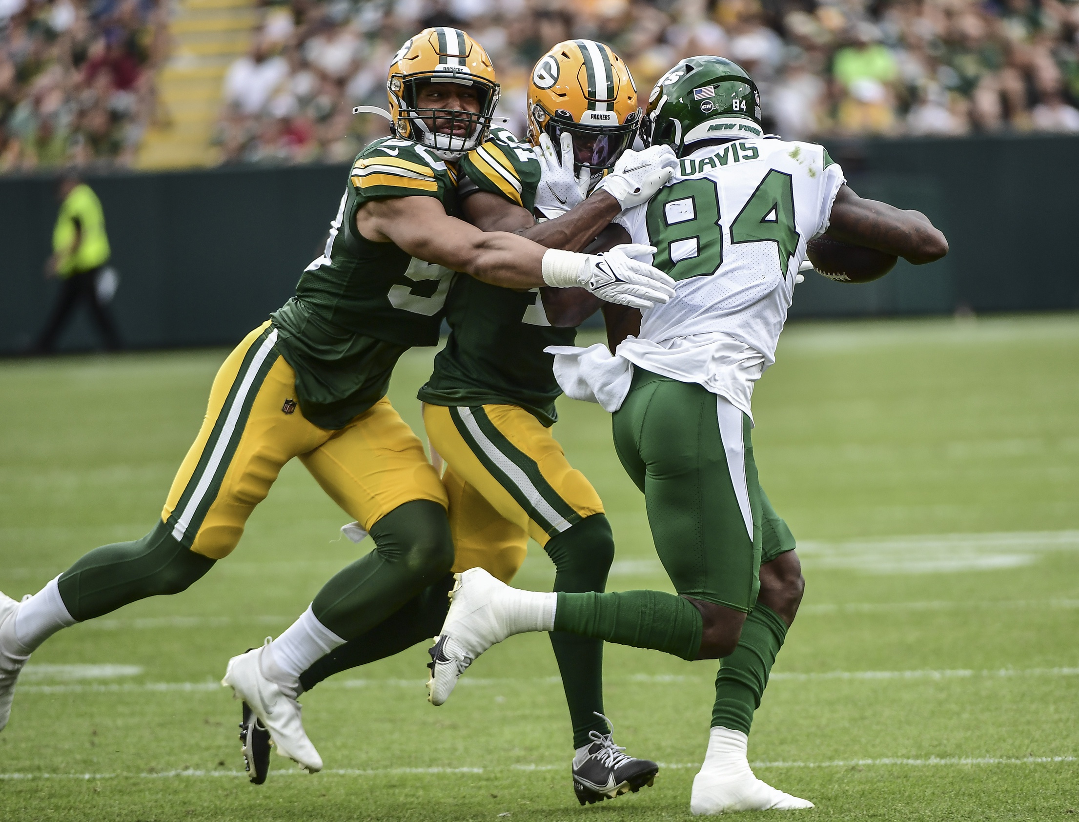 Green Bay Packers linebacker Tipa Galeai (50) defends against