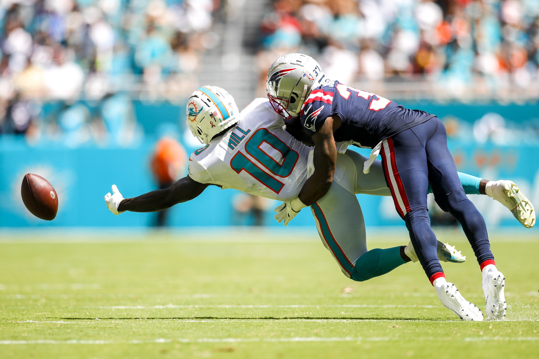 Jonathan Jones New England Patriots Blackout Football Photo