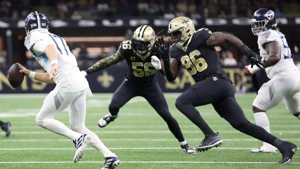 New Orleans Saints defensive end Carl Granderson signs a four-year