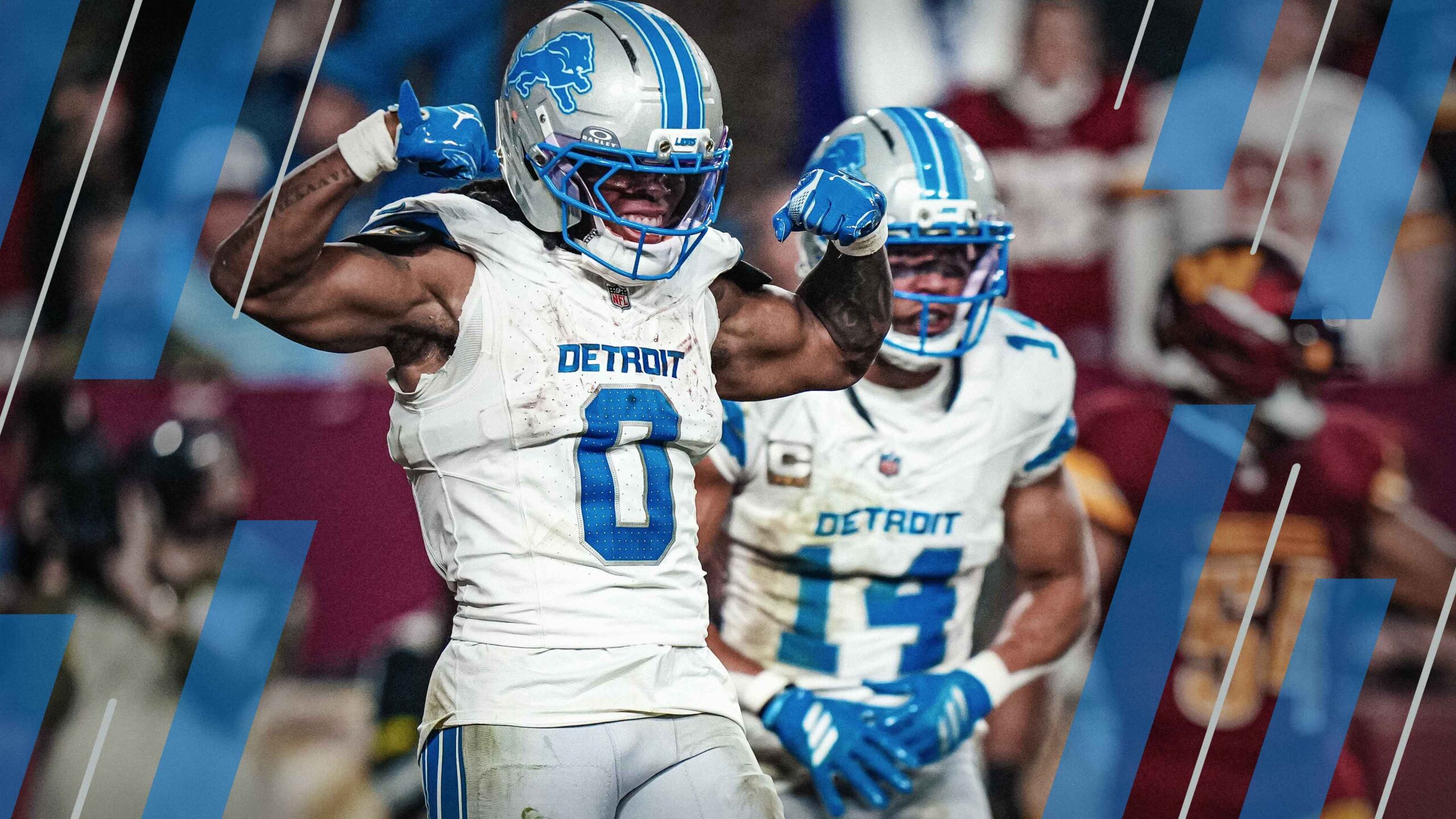 Jahmyr Gibbs celebrates after scoring a touchdown