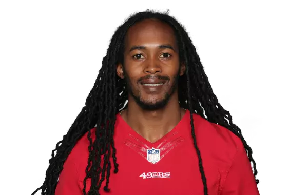 Travis Benjamin headshot